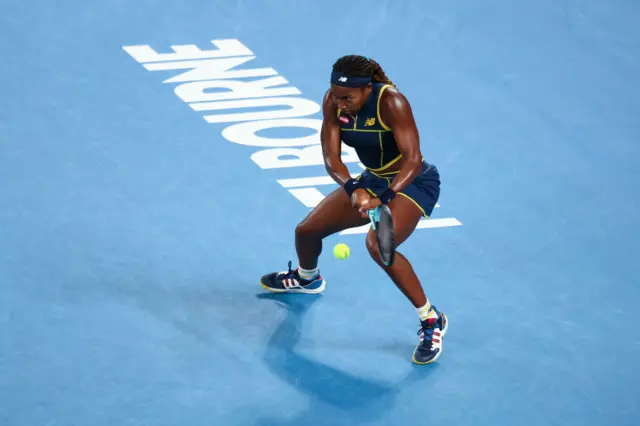 Coco Gauff hits a backhand shot