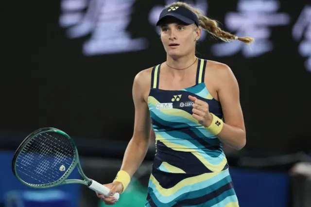 Dayana Yastremska clenches her fist in celebration