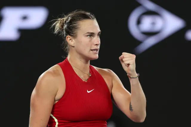 Aryna Sabalenka clenches her fist in celebration