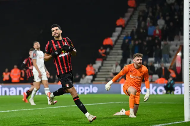 Dominic Solanke celebrates after scoring Bournemouth's fifth goal against Swansea