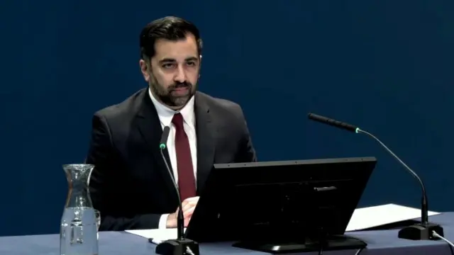 Screen grab from the UK Covid-19 Inquiry live stream of Scottish First Minister Humza Yousaf giving evidence to the UK Covid-19 Inquiry hearing at the Edinburgh International Conference Centre (EICC), during its second investigation (Module 2) exploring core UK decision-making and political governance