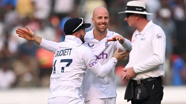 England's Jack Leach celebrates the wicket of Rohit Sharma