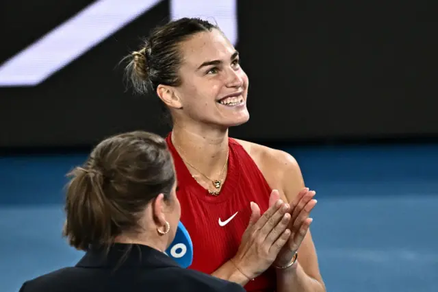 Aryna Sabalenka smiles during the post match interview