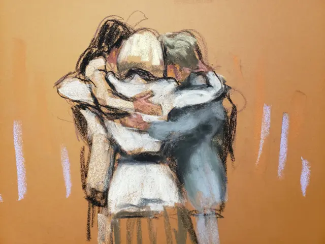 E. Jean Carroll hugs her team after the verdict was read during the second civil trial where Carroll accused former U.S. President Donald Trump of raping her decades ago, at Manhattan Federal Court in New York City, U.S., January 26, 2024, in this courtroom sketch.