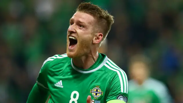 Steven Davis celebrates scoring for Northern Ireland.