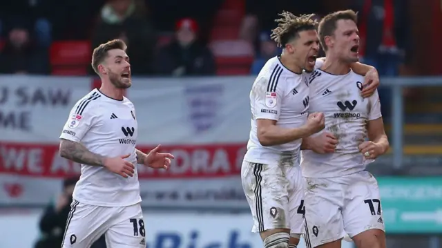 Salford City striker Matt Smith celebrates a goal