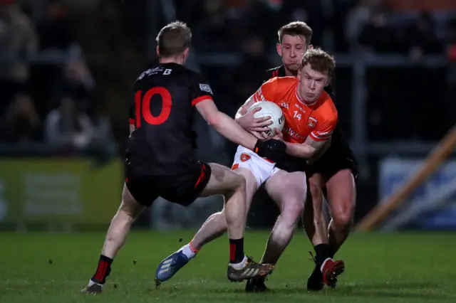 Conor Turbitt tries to make ground for Armagh at the Athletic Grounds