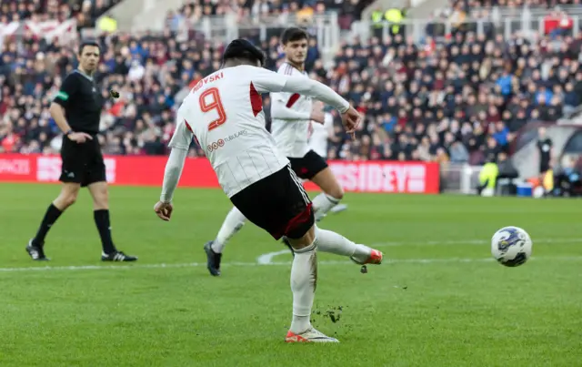 Aberdeen's Bojan Miovski scores a disallowed goal during a cinch Premiership match between Heart of Midlothian and Aberdeen at Tynecastle Stadium