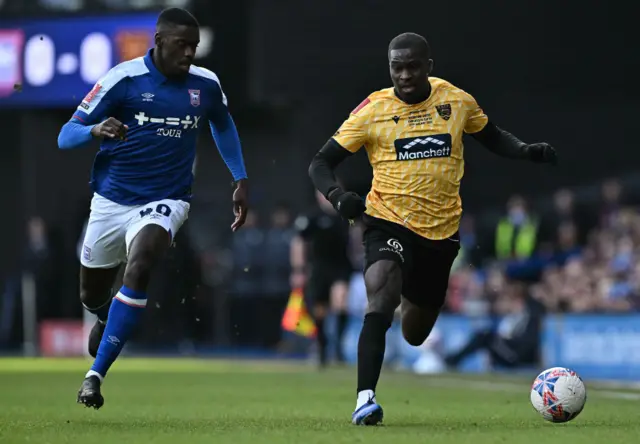 Tuanzebe tries to close down a Maidstone forward on the run.