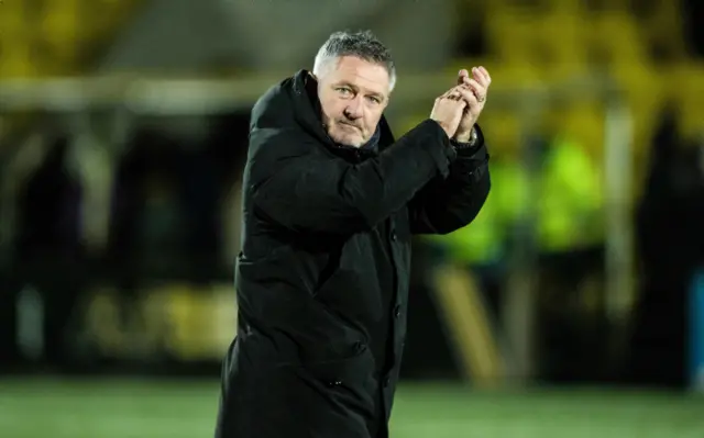 Manager Tony Docherty applauds fans at full time during a cinch Premiership match between Livingston and Dundee