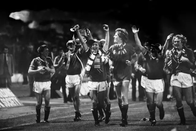 Manchester United players celebrate winning the FA Cup against Brighton in 1983