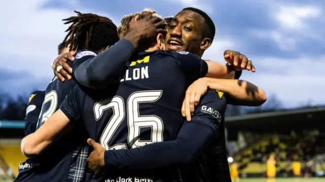 Dundee's Zach Robinson celebrates with Michael Mellon after scoring to make it 3-1 during a cinch Premiership match between Livingston and Dundee at the Tony Macaroni Arena, on January 27, 2024, in Livingston, Scotland.