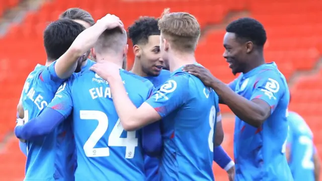 Stockport celebrate scoring a goal