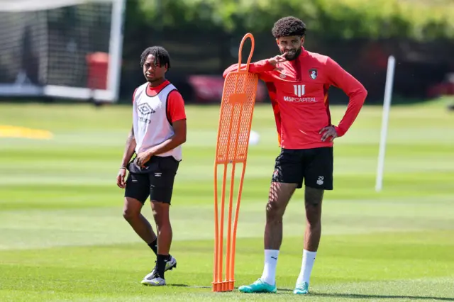 Moriah-Welsh (left) trains with Bournemouth's first team