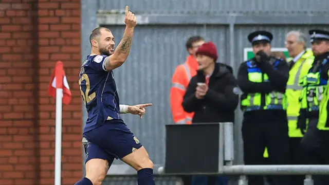 Charlie Austin celebrates a goal for Swindon Town