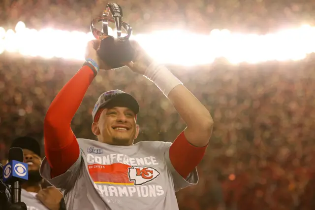 Patrick Mahomes lifts the AFC Conference trophy in January 2023