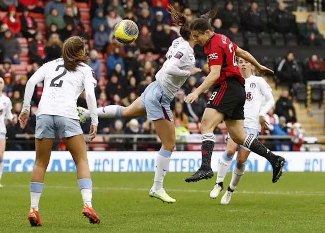 Rachel Williams heads towards goal.