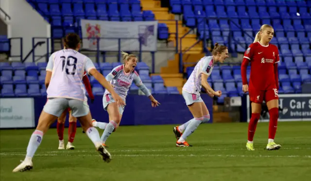 Miedema wheels away to celebrate opening the scoring for Arsenal.