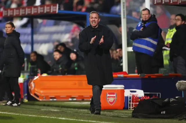 Jonas Eidevall applauds and shouts encouragement from the touchline.