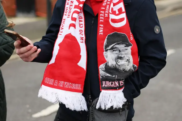 Liverpool fan with a Jurgen Klopp scarf