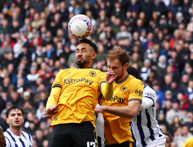 Matheus Cunha and Craig Dawson