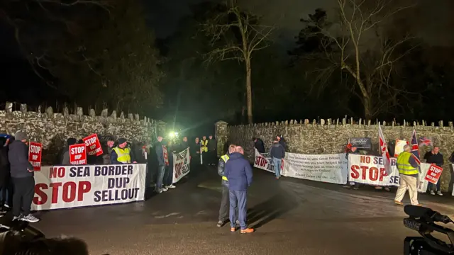 Protesters outside Larchfield Estate