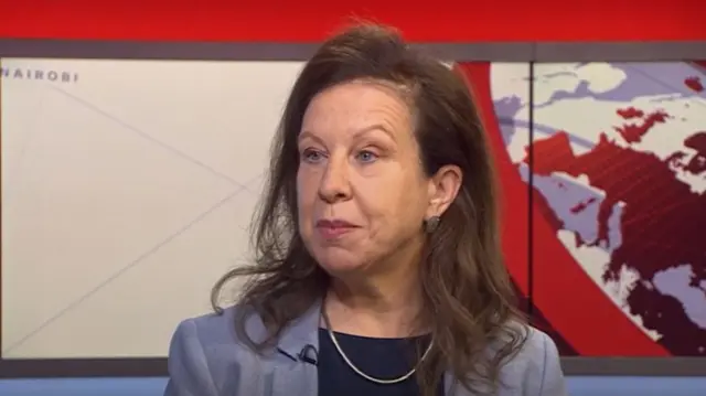 The BBC's Lyse Doucet sits in a studio, wearing a purple blazer