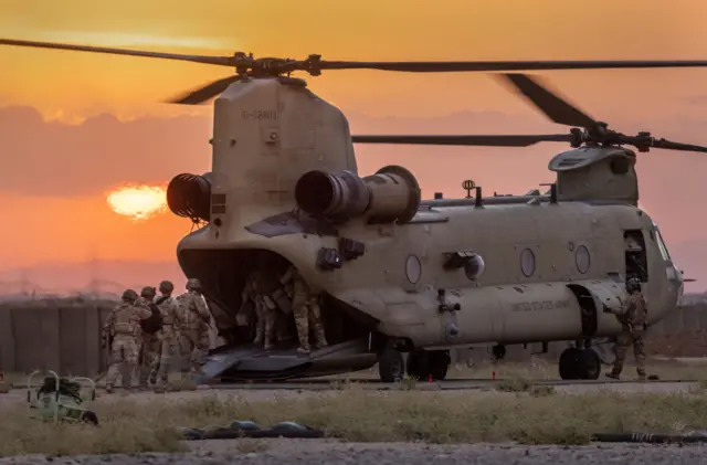 US troops board Chinook helicopter in north-east Syria (file photo)