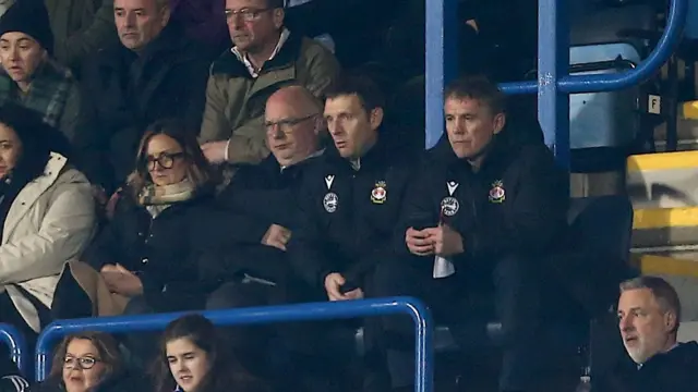 Phil Parkinson sat in stand