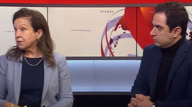 The BBC's Lyse Doucet and Parham Ghobadi sit in the BBC News channel studio