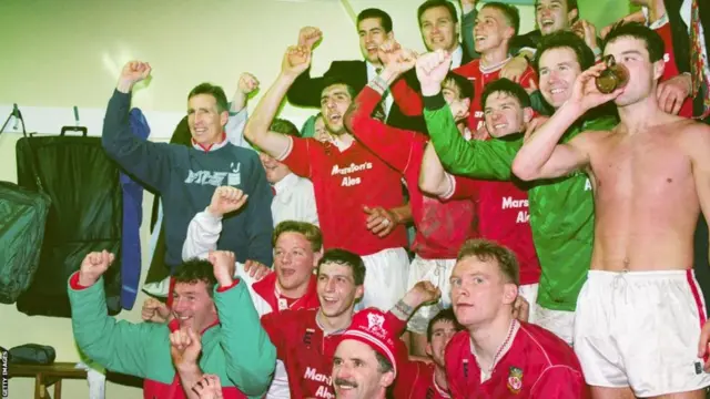 Wrexham in dressing room after Arsenal win in 1992