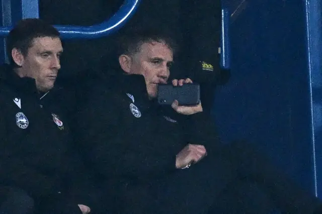 Wrexham boss Phil Parkinson in the stands at Blackburn