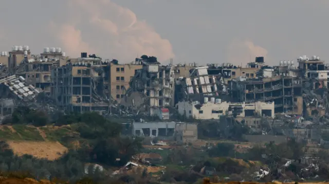 Destroyed buildings lie in ruin in the Gaza Strip