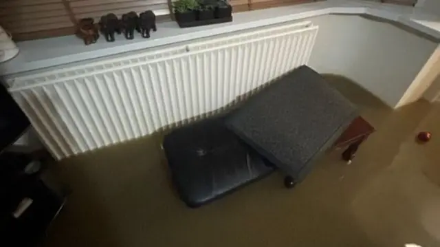 Flood water inside the home of Jacob Davidge