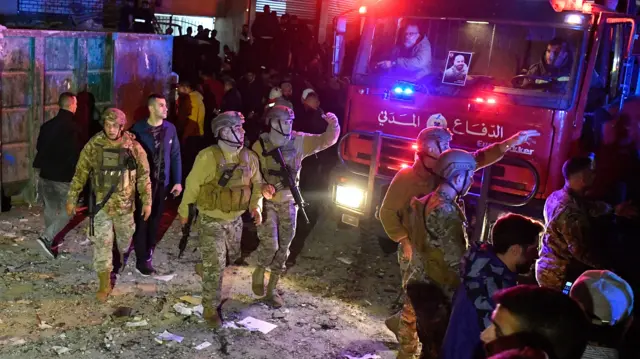 This image from yesterday shows Lebanese soldiers at the site of an explosion in a district of Beirut, Lebanon, where Hamas's deputy leader was killed