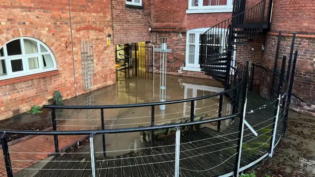 Rising water levels outside flats