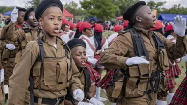 People, wearing similar clothes of soldiers during World War I, deliver various performance during the Diturupa Festival in Mabopane township of Gauteng, South Africa on January 02, 2024