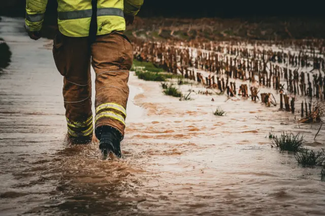 Wading through water