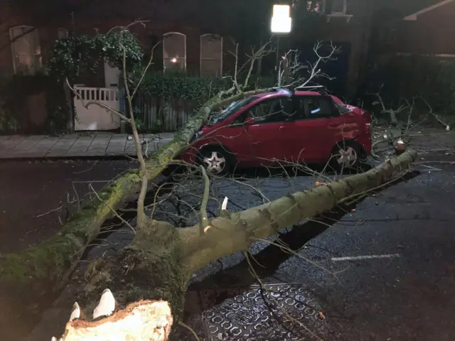 A damaged car in west London on Tuesday