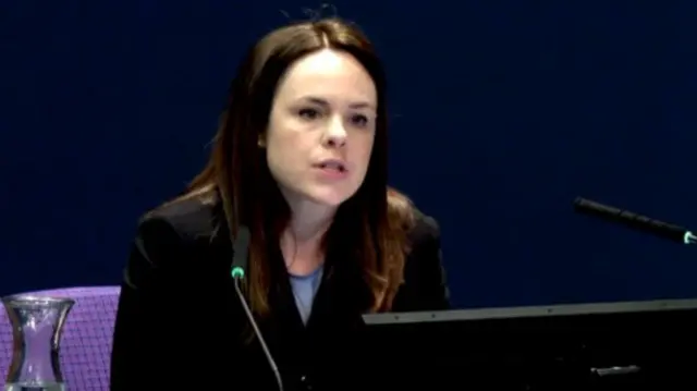 Ex-Scottish Finance Secretary Kate Forbes speaks into a microphone at the Covid inquiry