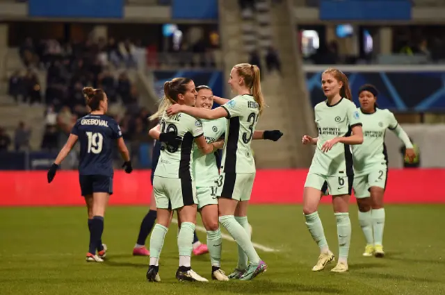 Fran Kirby of Chelsea celebrates with teammates