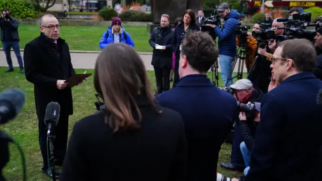 Chris Heaton-Harris addresses reporters outside the Palace of Westminster