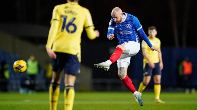 Portsmouth defender Connor Ogilvie lets fly at goal