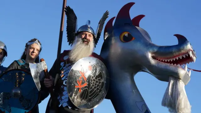 Chief Viking Richard Moar and daughter Jenna wear Viking armour