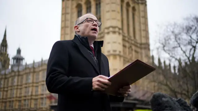 Chris Heaton-Harris addresses reporters outside the Palace of Westminster