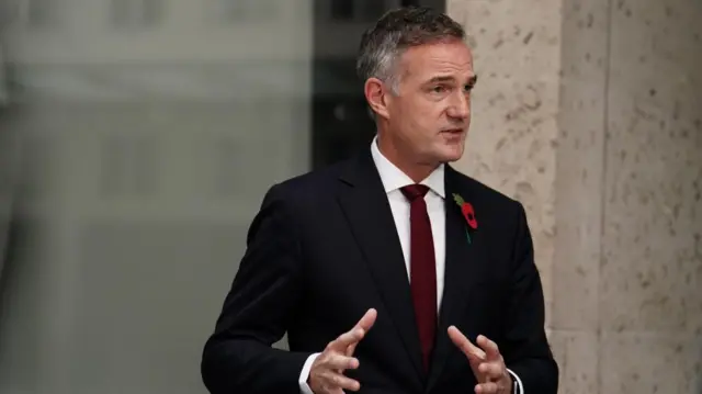 Peter Kyle speaks outside a BBC building