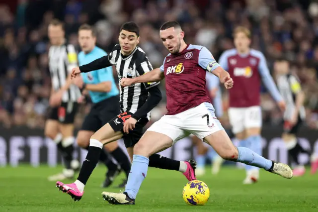 John McGinn and Miguel Almiron