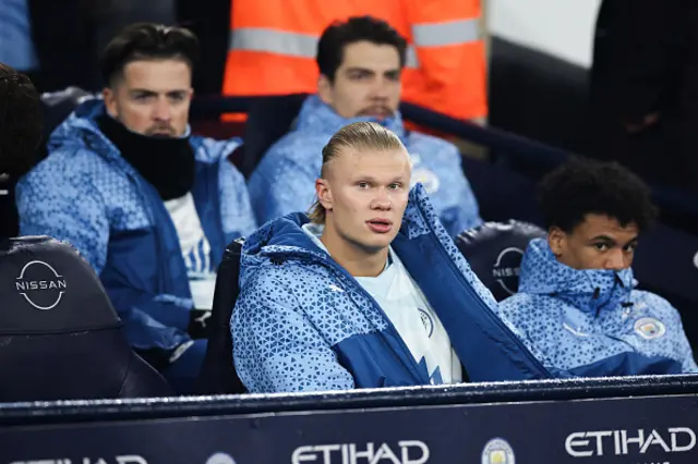 Erling Haaland of Manchester City sits on the bench