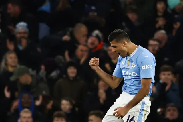 Rodri celebrates after scoring