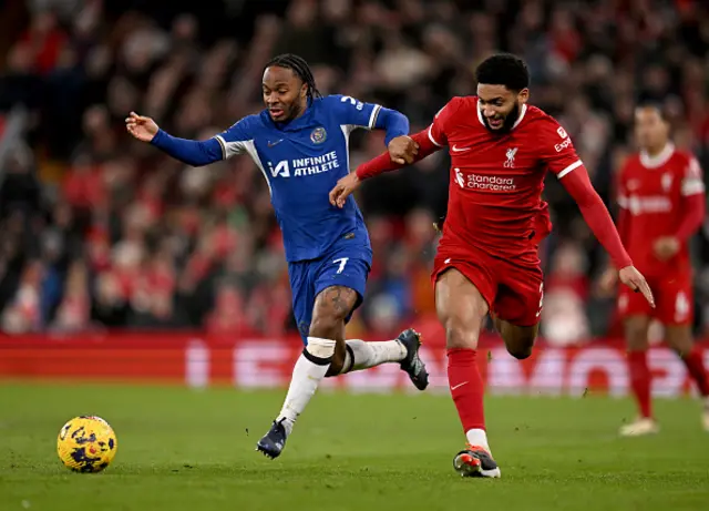 Raheem Sterling vies with Joe Gomez